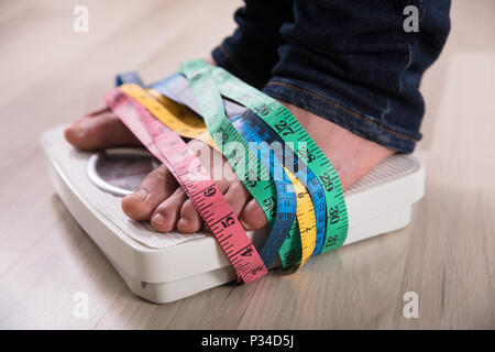 Weight measurement, close-up Stock Photo - Alamy