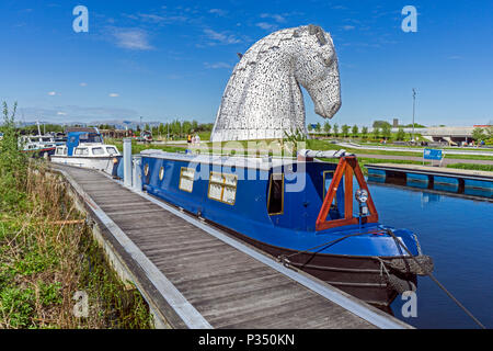 Boats in the canal at the Kelpies sited by the Forth & Clyde Canal at The Helix park in Falkirk near Grangemount in Scotland UK Stock Photo