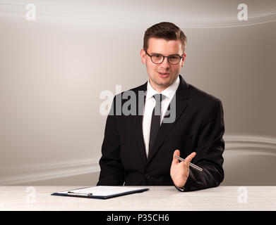 Televison presenter host in live show with blank background Stock Photo