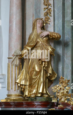 Virgin Mary statue on the altar of Holy Cross in the church of Immaculate Conception in Lepoglava, Croatia Stock Photo
