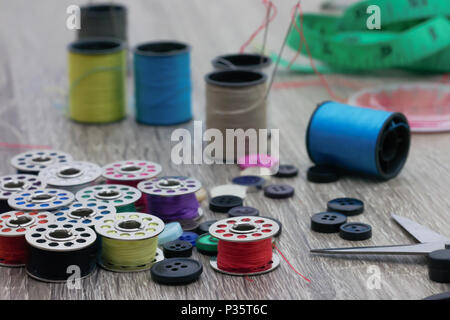 Garment accessories and Clothing Repairing Equipment. Select focus shallow depth of field and blurred background Stock Photo