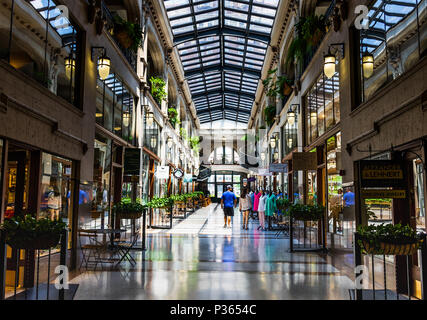 ASHEVILLE, NC, USA-10 JUNE 18:  A hallway inside the Grove Arcade, featuring a variety of small shops. Stock Photo