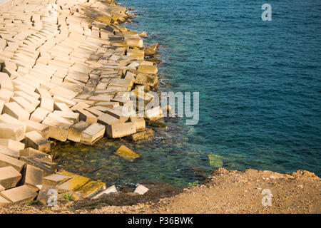 Breakwaters, Port protection with concrete blocks, Puerto de Mazarrón, Murcia, Costa Calida, Spain. Stock Photo