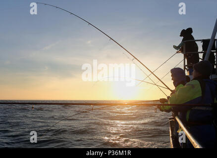 Wismar, Germany, men in deep-sea fishing on the Baltic Sea Stock Photo