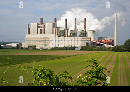 A dirty power station in beautiful green landscape. Stock Photo