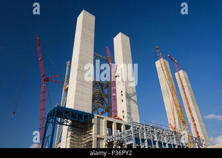 Construction site of a new brown coal power station against blue sky. Stock Photo