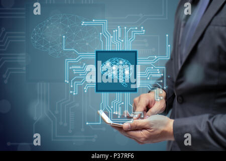 business man or engineer use ai or artificial intelligent concept,Cloud computing, data mining, machine learning, neural networks to monitor, research Stock Photo