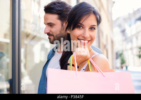 Fashion, shopping bags and portrait of woman isolated on a png background  in retail, designer clothes and cosmetics. Shopping, advertising and full  body of girl excited for promotion deal, sale and discount