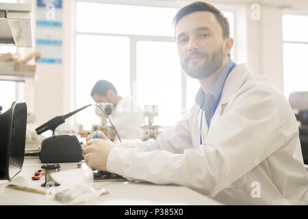 Handsome Engineer at Workplace Stock Photo