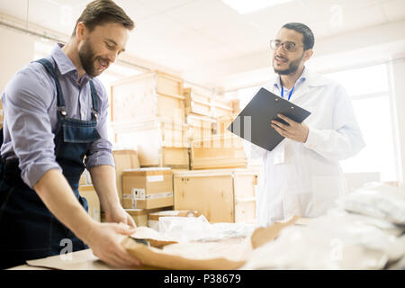 Working Process at Factory Warehouse Stock Photo