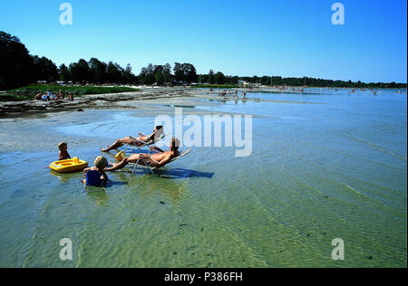 Boeda, Sweden, Badegaeste on the beach Stock Photo