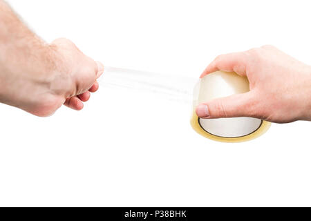 Male hands use an adhesive tape, isolated on a white background, first-person view Stock Photo