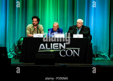 Pasadena, California, June 16, 2018, Ancient Aliens star Giorgio Tsoukalos and Producer Kevin Burns celebrate with Erich Von Daniken the 50th anniversary of the book, Chariots of the Gods at AlienCon day 2. They finished the session answering questions fron the audience.  Credit: Ken Howard Images/Alamy Live News Stock Photo