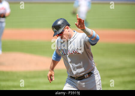 Baltimore, MD, USA. 17th June, 2018. Miami Marlins first baseman Justin  Bour (41) walks to the dugout before the start of MLB action between the  Miami Marlins and the Baltimore Orioles at