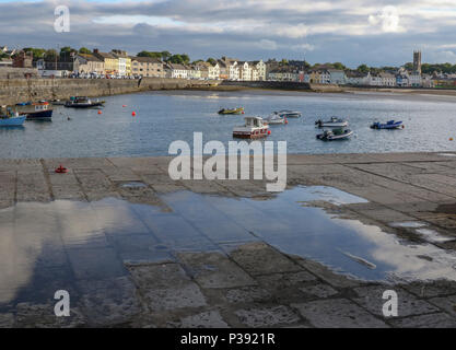 Donaghadee County Down, Northern Ireland. 17 June 2018. UK weather - after a mainly overcast day with showers, there were a few short spells of sunshine late in the day. Donaghadee harbour lit up by sunshine. Credit: David Hunter/Alamy Live News. Stock Photo