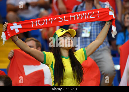 Rostov On Don, Russland. 17th June, 2018. Brazilian fan, football fan, woman, female with Swiss fan scarf, Brazil (BRA) -Swiss (SUI) 1-1, preliminary round, Group E, match 09, on 17.06.2018 in Rostov-on-Don, Rostov Arena. Football World Cup 2018 in Russia from 14.06. - 15.07.2018. | usage worldwide Credit: dpa/Alamy Live News Stock Photo