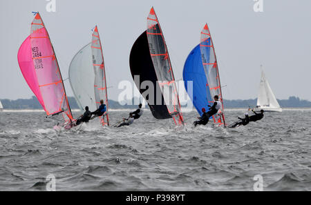 17 June 2018, Kiel, Germany: Sailers of the 29 Class during a regatta on Schilksee fjord during the of the Kieler Woche. The Kieler Woche is one of the largest sailing events in the world - more than 4000 athletes from 60 nations have applied to compete. Photo: Carsten Rehder/dpa Stock Photo