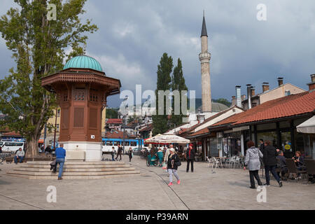 Baščaršija Square, Stari Grad (Old Town), Sarajevo, Bosnia and Herzegovina, Europe. The Sebilj wooden fountain is on the left. Stock Photo