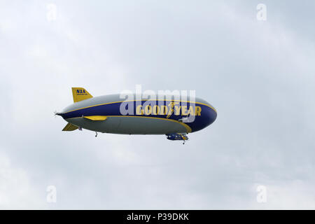 SUFFIELD, OHIO / USA – JUNE 16: The Goodyear blimp Wingfoot One on June 16, flying above Wingfoot Lake, Suffield, Ohio. This is at Blimp Base One Stock Photo