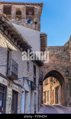 Street with old houses and arch in the center of Atienza, Spain Stock Photo