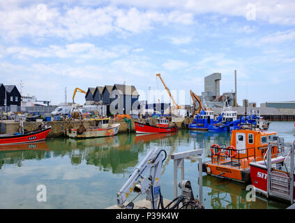 Fishing boats in Whitstable harbour, Kent, UK Stock Photo