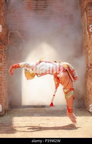 Hanuman (monkey god) somersaults in Khon or Traditional Thai Pantomime as a cultural dancing arts performance in masks dressed based on the characters Stock Photo