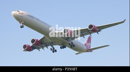 Virgin Atlantic Airbus a340 G-VBUG on final approach to London-Heathrow Airport LHR Stock Photo