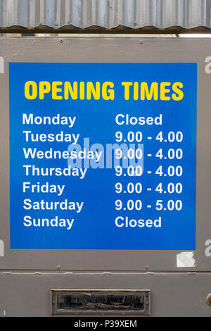 Shop opening hours with days of the week in the old city of Le Mans ...