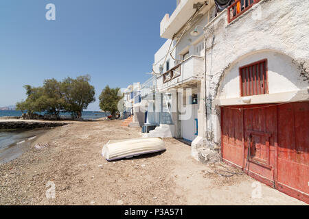 KLIMA, GREECE - MAY 2018: Colourfull old houses in fishermen town of Klima on Milos island, Greece. Sunny day, wide angle lens shot. Stock Photo