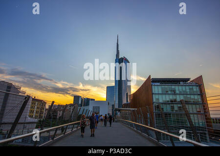 the Unicredit tower in the distance from pedestrian bridge, Milan, Italy Stock Photo