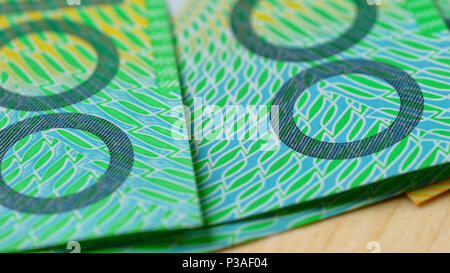 Macro closeup of Australian one hundred dollar notes, shallow dof. Stock Photo