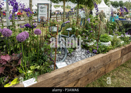 What a Load of Rubbish - a Beautiful Border highlighting ways to reuse old materials in a garden; Gardeners' World Live; NEC, Birmingham, England, UK Stock Photo