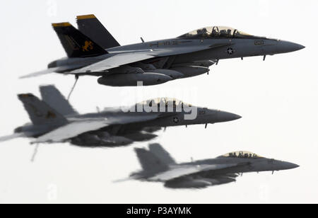 Three U.S. Navy F/A-18F Super Hornets aircraft assigned with Strike Fighter Squadron (VFA) 32 fly by the aircraft carrier USS Harry S. Truman (CVN 75) during flight operations in the Persian Gulf April 2, 2008. Truman is on a scheduled deployment in support of Operations Iraqi Freedom and Enduring Freedom.