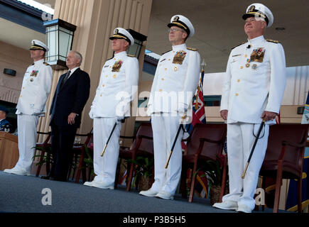 From left, U.S. Navy Capt. David G. Kloak, a chaplain; Secretary of Defense Robert M. Gates; Adm. Robert F. Willard, commander of U.S. Pacific Command (PACOM); Chairman of the Joint Chiefs of Staff Navy Adm. Mike Mullen; and Adm. Timothy Keating stand at attention during the PACOM change of command ceremony on Camp HM Smith in Hawaii Oct. 19, 2009. During the ceremony, Willard relieved Keating as commander of PACOM. (DoD Stock Photo