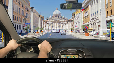 Driving a car on the scenic Via della Conciliazione leading to St. Peter's Church, Rome, Italy