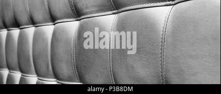 Tufted grey leather headboard texture, used for background Stock Photo