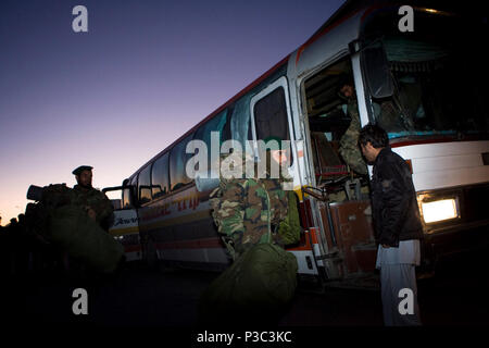 (Nov. 19, 2009) Graduates from Afghan National Army accelerated combat company training program arrive at Kabul International Airport to be transported to Camp Bastion in the Helmand Province where they will reinforce troops of the ANA 205th battalion. Accelerated companies are part of the goal of a 134,000 soldier army by October of 2010. The companies play an integral role in the increased capability of the Afghanistan National Army.   091119 Stock Photo