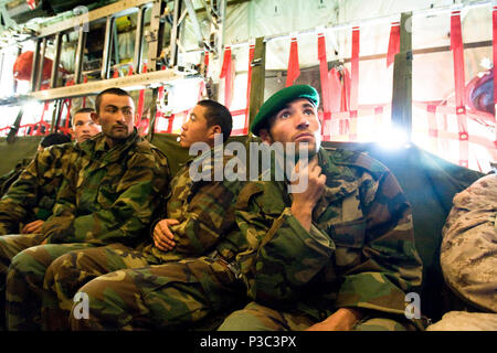 KABUL (Nov. 19, 2009) Graduates from Afghan National Army accelerated combat company training program in route to Camp Bastion in the Helmand Province where they will reinforce troops of the ANA 205th battalion.  Accelerated companies are part of the goal of a 134,000 soldier army by October of 2010. The companies play an integral role in the increased capability of the Afghanistan National Army.   091119 Stock Photo