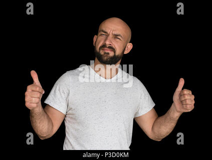 white bald man with a beard in a white T-shirt keeps fingers up. isolated Stock Photo