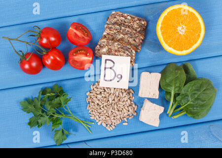 Nutritious products containing vitamin B9, natural sources of minerals and folic acid, concept of healthy nutrition Stock Photo