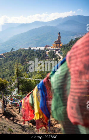 169 feet tall bronze Buddha statue shining bright in the daytime from the viewpoint Stock Photo