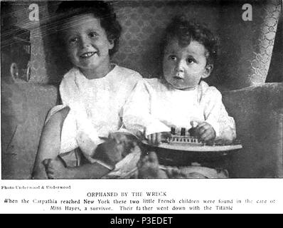 TITANIC - A 1912 newspaper photograph showing two French children orphaned by the Titanic disaster and saved by the Carpathia under the care of a Miss Hayes Stock Photo