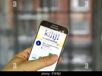 MONTREAL, CANADA - MARCH 10, 2018: Kijiji app on a phone screen. Kijiji is an online classified advertising service organized by city and urban region Stock Photo