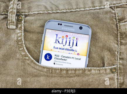 MONTREAL, CANADA - MARCH 10, 2018: Kijiji app on a phone screen. Kijiji is an online classified advertising service organized by city and urban region Stock Photo