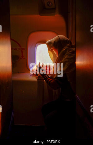 Pilot Praying On Ramp man praying over airplane on runway background Stock Photo - Alamy