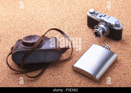 Gadgets and accessories for men on light wooden background