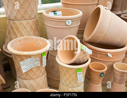 Display of terracotta pots on sale, The Walled garden plant nursery, Benhall, Suffolk, England, UK Stock Photo