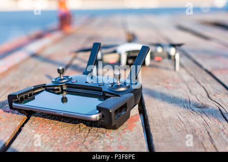 Drone and control panel on an old board Stock Photo