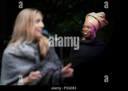 Ley Adewole lead vocalist with the The Grace Notes performing at Trebah Garden amphitheatre in Cornwall. Stock Photo