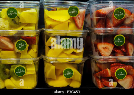 Organic labeled fruit packed for convenience in plastic container Stock Photo